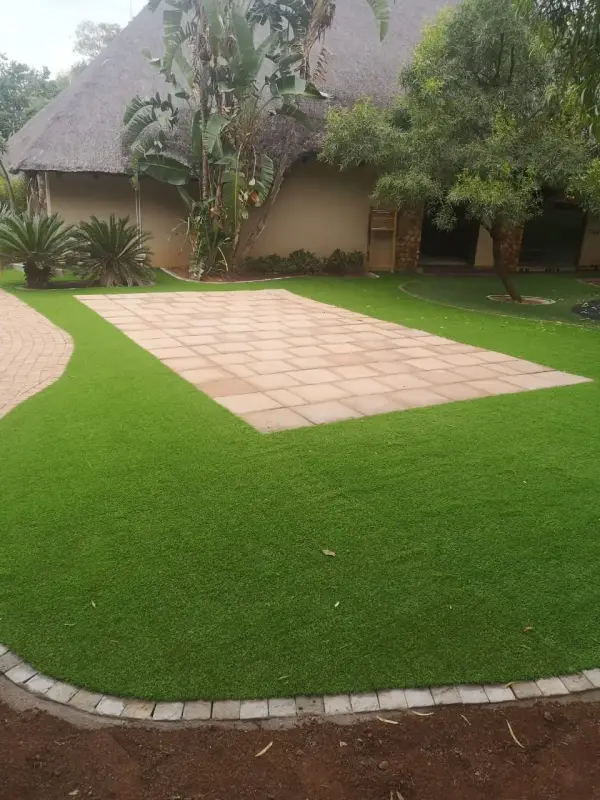 Paved deck set into lawn at Mabula Game Lodge