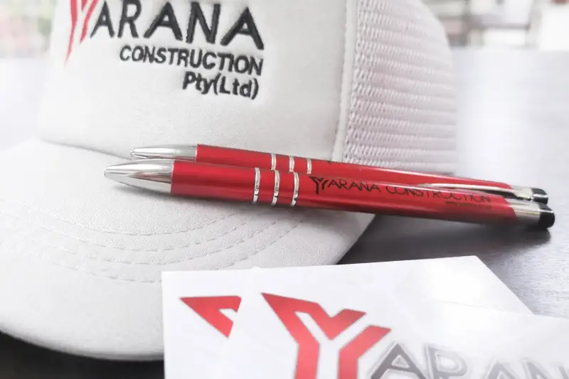 Yarana Construction branded cap and pens